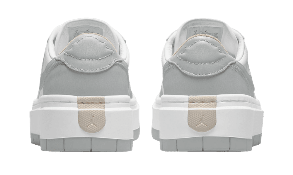 Rear view of white Air Jordan 1 Low Elevated sneakers with grey accents.