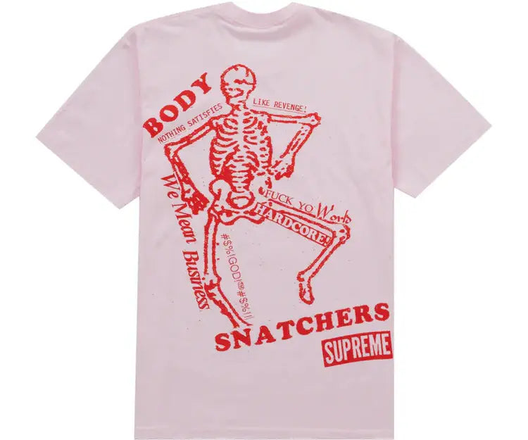 Pink Supreme t-shirt with a red skeleton graphic and text.