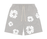 Grey shorts with white wreath pattern and drawstring.
