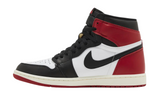 Jordan 1 Retro High OG Black Toe Reimagined sneakers in black, red, and white.