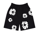 Black shorts with white floral wreath print.