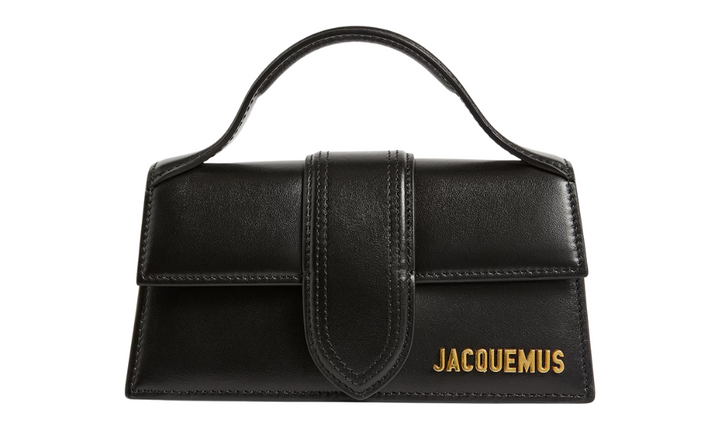 Jacquemus Le Bambino small black top handle bag with gold logo.