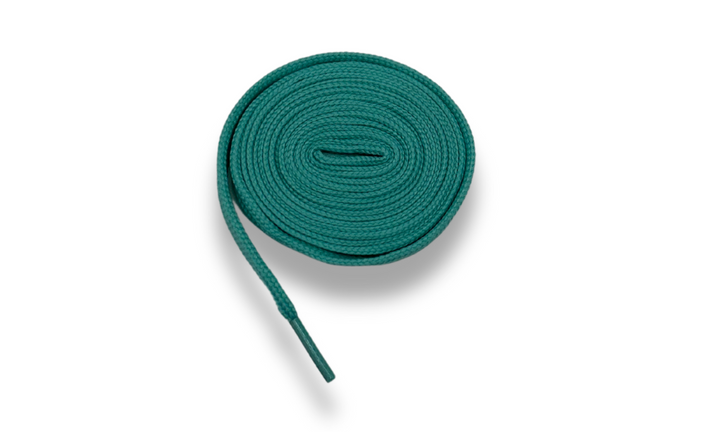 Turquoise shoelaces for sneakers, coiled.