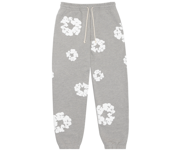 Grey sweatpants with a white floral wreath pattern and a drawstring waist.