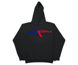 Black Vlone x Kodak Black hoodie with red and blue graphic logo.