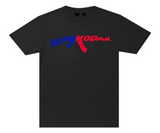Black t-shirt with blue and red Vlone and Kodak branding.