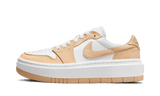 A white and tan Air Jordan 1 Low LV8D Elevated sneaker with a thick sole.
