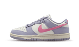 Nike Dunk Low 'Indigo Haze' sneaker in white, purple, and pink.
