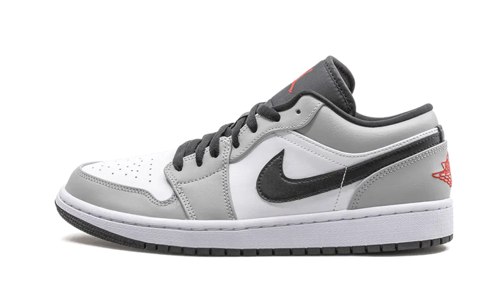 Air Jordan 1 Low Light Smoke Grey sneaker with white, grey, and black accents.