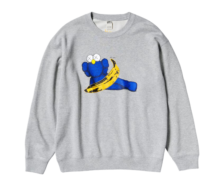 KAWS x Uniqlo Warhol Graphic sweatshirt in gray with a blue character holding a banana.