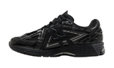 New Balance 1906A fekete hálós és bőr sportcipő.