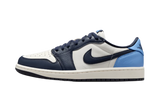 Air Jordan 1 Low OG Obsidian UNC sneaker with white, navy, and light blue accents.