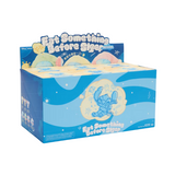 A sealed case of Disney Stitch plush keychains with a "Eat Something Before Sleep" theme.