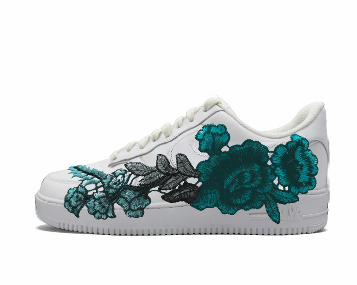 Nike Air Force 1 Low '07 white sneakers with blue rose embroidery.