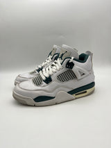 Használt Jordan 4 Oxidized Green cipő fehér és zöld színben.