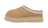UGG Tazz Slipper Sand, a tan suede slipper with a patterned trim and platform sole.