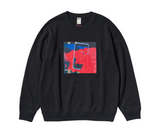 Black KAWS x Uniqlo sweatshirt with a graphic print of red cartoon hands holding a smartphone.