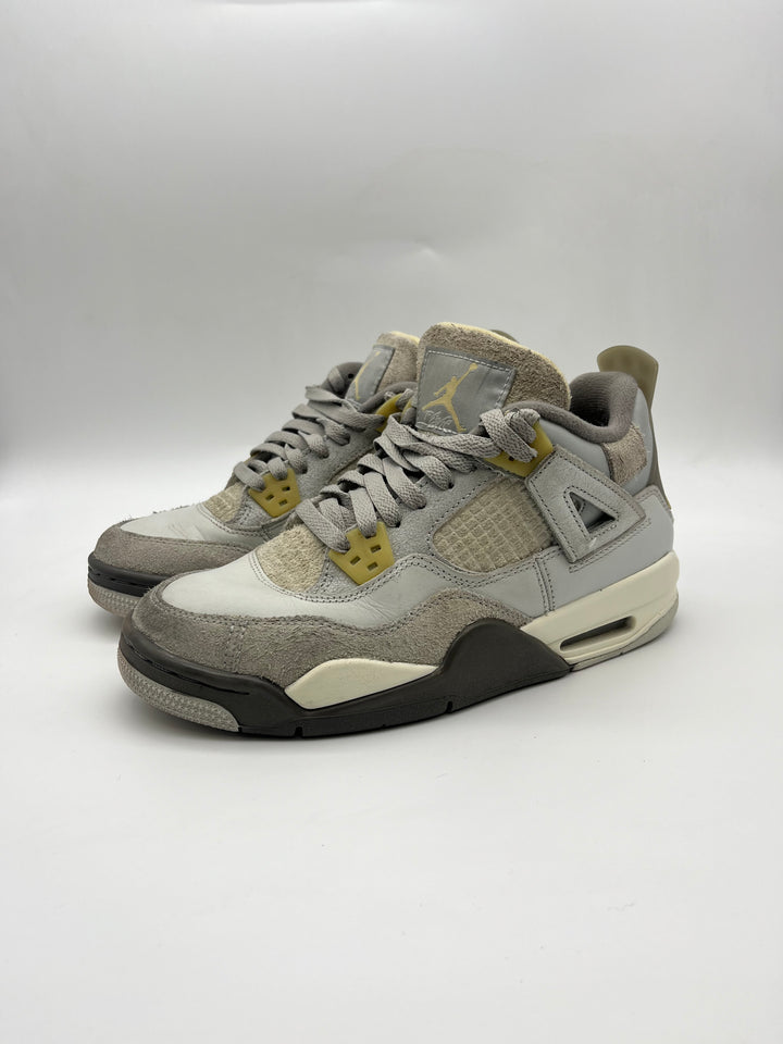 Használt Jordan 4 Craft cipő szürke és sárga színben.