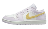 Air Jordan 1 Low Barely Grape women's sneaker in light purple and white with yellow accents.