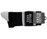 Balazs Kicks black socks with white stripes and a tag.