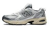 New Balance 530 silver and cream sneakers.