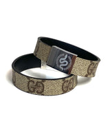 Gucci barna mintás karkötő kígyóval és ezüst csattal.