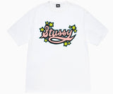 White t-shirt with a pink "Stussy" script logo surrounded by yellow stars.