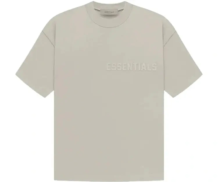 Essentials Seal Tee in beige with embossed logo.