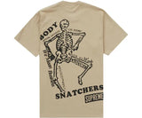 Supreme Body Snatchers Tee Khaki with skeleton graphic.