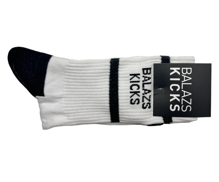 Balázs Kicks white socks with black stripes and logo tag.
