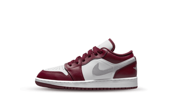 Air Jordan 1 Low Bordeaux sneaker with white and maroon panels and a silver Nike swoosh.