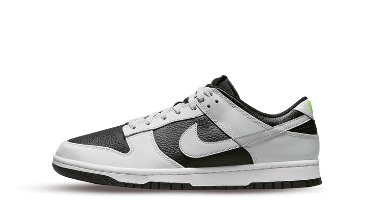 Nike Dunk Low Grey Panda Volt cipő fekete és fehér színben, neon zöld kiemelésekkel.