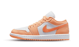 Air Jordan 1 Low Sunset Haze sneaker with white and orange accents.