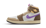 Air Jordan 1 Zoom Air CMFT Palomino sneaker in white, beige, brown, and purple.
