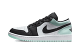 Air Jordan 1 Low Tie Dye cipő fekete, fehér és menta színben.