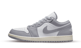 Air Jordan 1 Low Vintage Stealth Grey sneaker with white and grey leather.