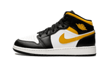 Air Jordan 1 Mid White Pollen Black sneaker with yellow accents.