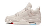Air Jordan 4 Retro Blank Canvas vászoncipő piros és kék részletekkel.