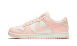 Fehér és narancssárga bőr Nike Dunk Low cipő.
