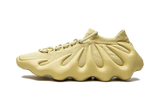 Adidas Yeezy 450 Sulfur sneaker with a knit upper and claw-like sole.