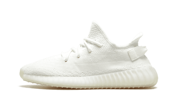 Fehér Yeezy Boost 350 V2 cipő krémfehér felsőrésszel.