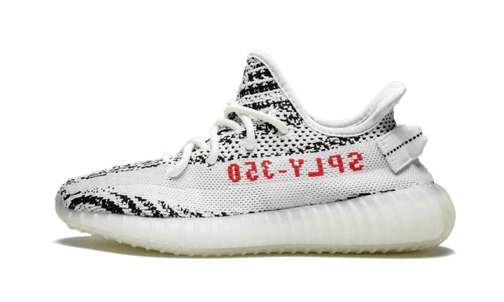 Yeezy Boost 350 V2 Zebra cipő fehér és fekete csíkos felsőrésszel.