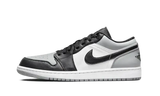 Air Jordan 1 Low Shadow Toe sneaker with black, white, and grey color blocking.