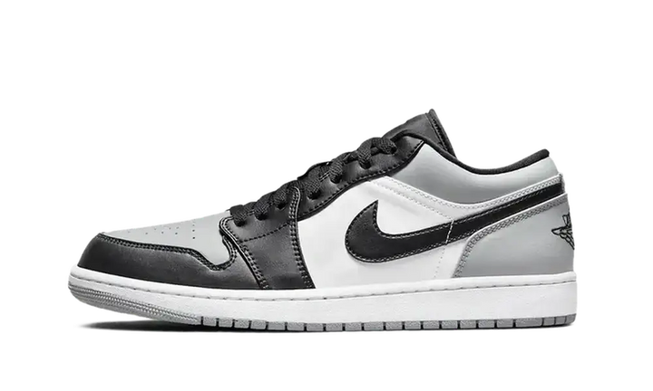 Air Jordan 1 Low Shadow Toe sneaker with black, white, and grey color blocking.