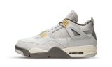 Air Jordan 4 Retro SE Craft Photon Dust sneaker in shades of gray with yellow accents.