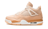 Air Jordan 4 Shimmer sneaker with a beige Durabuck upper and translucent wings.