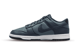 Nike Dunk Low Retro Armory Navy sneaker with navy leather overlays and white sole.
